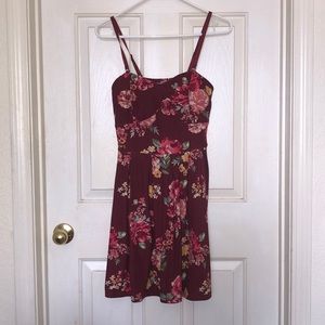 A maroon floral dress